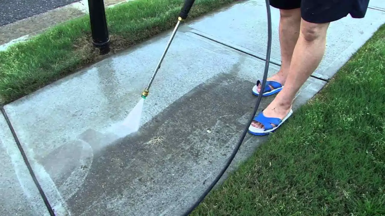 Rinsing The Sidewalk